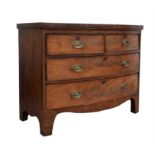 A mahogany bowfront chest, with two short and two long drawers, on bracket feet, 80cm high x 100.