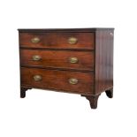 A mahogany chest of drawers, 19th Century, with rectangular top above three long drawers,