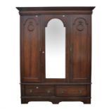 Edwardian mahogany three section wardrobe, with plain moulded cornice, above central mirror panel,