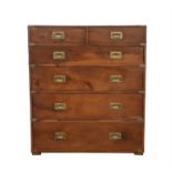 A Yew wood campaign style chest of drawers, with two short and four graduated drawers,