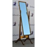 A modern gilt-gesso cheval mirror, 155cm high, and a beechwood pedestal, with fluted, collared stem,
