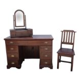 Attributed to and by Rail Antiques, An African hardwood kneehole desk, With a frieze drawer and two