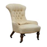 Victorian walnut nursing chair, with yellow button back upholstery, 81cm high.  Provenance: From