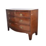 A mahogany bow-fronted chest of drawers, early 19th Century, with two short and two long drawers,