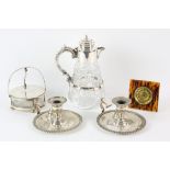 Silver plated and glass butter dish, claret jug, pair of chamber sticks and a faux tortoiseshell