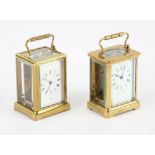 Two miniature brass carriage clocks, both with white enamel dials, with Roman numeral chapter rings,