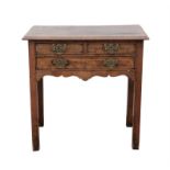 18th century crossbanded walnut side table, two short drawers over one long on square supports,