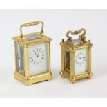 A French miniature carriage clock, with fluted columns and ball finials, the white enamel dial with