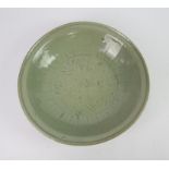 Chinese celadon Longquan bowl, incised to the interior with Chrysanthemums and leaves, damages,