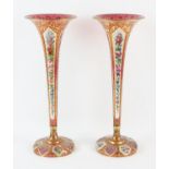 Pair of Bohemian trumpet vases, 19th Century, decorated with floral panels on white opaline glass,