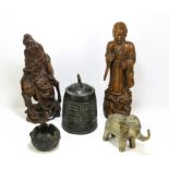 Two Bamboo figures; one seated on a horse [possibly Zhong Kui], 26 cm high, and one holding a peach
