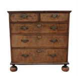 Walnut and line inlaid chest, 18th Century and later, with two short and three long drawers,