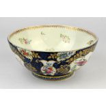 Worcester style porcelain blue scale punch bowl, the exterior decorated with reserves of exotic