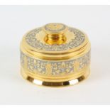 Russian( St Petersberg) gilt metal circular casket and cover, 20th Century, 11cm diameter,