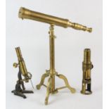 Early 20th century brass field microscope, student microscope and a modern brass telescope with