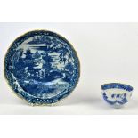 Tranfer printed Willow Pattern tea bowl and a similar shallow dish, 21cm dia