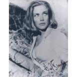 Honor Blackman - A signed 8 x 10 inch colour photograph of her as character Pussy Galore in the