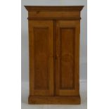 FLOR DE TOBACCOS, a pine cigar storage cupboard, 20th Century, with two panelled doors,