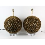 JULIAN CHICHESTER, a pair of Port Quinn lamps, bronzed metal with lucite bases, 51cm high (2)