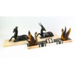 ART DECO, a silvered spelter figure group of an antelope and hind, on a rectangular onyx base,