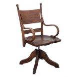 ARTS AND CRAFTS, an oak and bent wood swivel chair, on four down swept feet, 98cm high