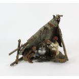 BERGMANN, a cold painted bronze Arab figure group of two men seated by a fire with a cauldron,