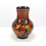 WALTER MOORCROFT (BRITISH, 1917 - 2002) for MOORCROFT, an ovoid vase with cylindrical neck,