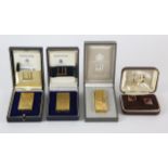 DUNHILL, Three gold plated lighters, one marked, Swiss Made, in cases, together with a pair of