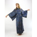 A blue mid-century Chinese Kimono/dressing gown with original belt depicting tea houses and punts.