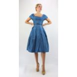 A rare NORMAN HARTNELL Peacock blue silk cocktail dress with netted underskirt UK10 made in