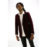 A burgundy velvet tuxedo/dinner trouser suit by CECIL GEE dating from the early 1970s (36" chest