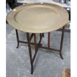 Brass tray with Chinese design on matching folding stand 75cm dia