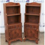 Pair of yew wood miniature bookcases, with shelves above frieze drawer and panelled cupboard door,