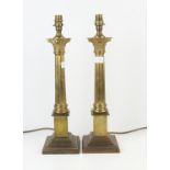 Brass extending standard lamp base, H158 together with a pair of brass lamps on Corinthian columns,