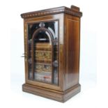 Edwardian rosewood and marquetry inlaid smokers cabinet, the gallery top over astragal glazed door