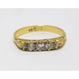 Victorian diamond half hoop, five gradating old cut diamonds set in a carved half hoop,