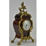 French gilt metal and walnut mantel clock, late 19th/early 20th Century, the white enamel dial with