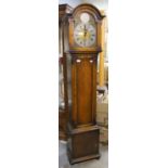 Modern oak longcase clock the brass dial with silvered chapter ring and roman numerals,