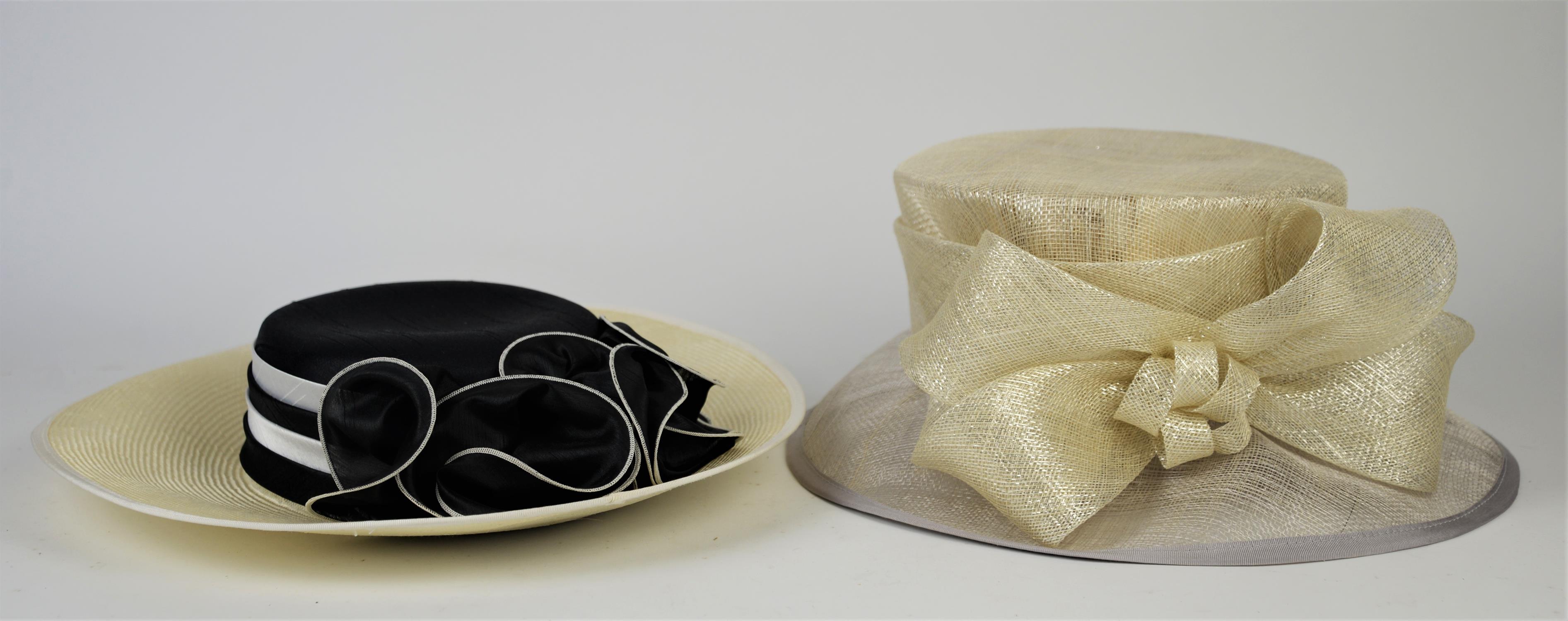 Two ladies hats, in a cardboard hat box (2)