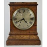 Victorian walnut mantle clock the silvered dial with Roman numerals the two train movement striking