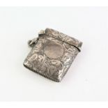 Bright crest silver vesta case with vacant round cartouche, Birmingham 1904