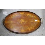 Edwardian mahogany oval tray, inlaid with musical instruments, 58.5 x 39cm
