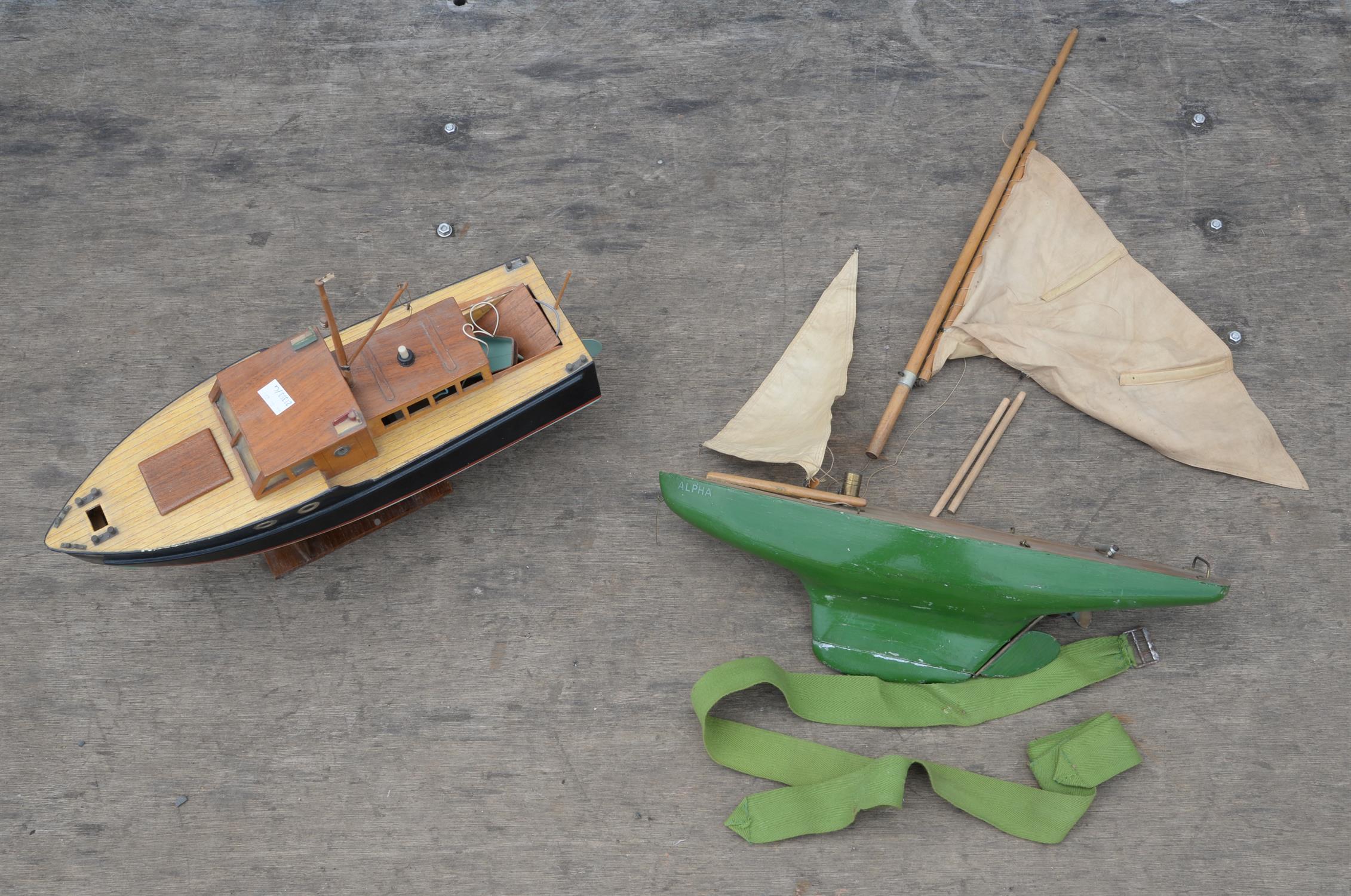 A plywood model of a boat, Beta, with cabin and electric motor, on stand, 43.5cm long, - Image 2 of 4