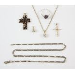 A group of jewellery including a cubic zirconia cross pendant in 14ct, a 9ct Figaro chain,