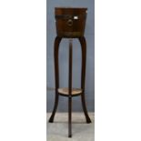 Brass bound mahogany jardiniere and stand by R A Lister and Co. Ltd., 100.5cm high