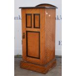A Walnut veneered pot cupboard, single door raised on plinth base. 79 cm high x 37 cm wide x 33 cm