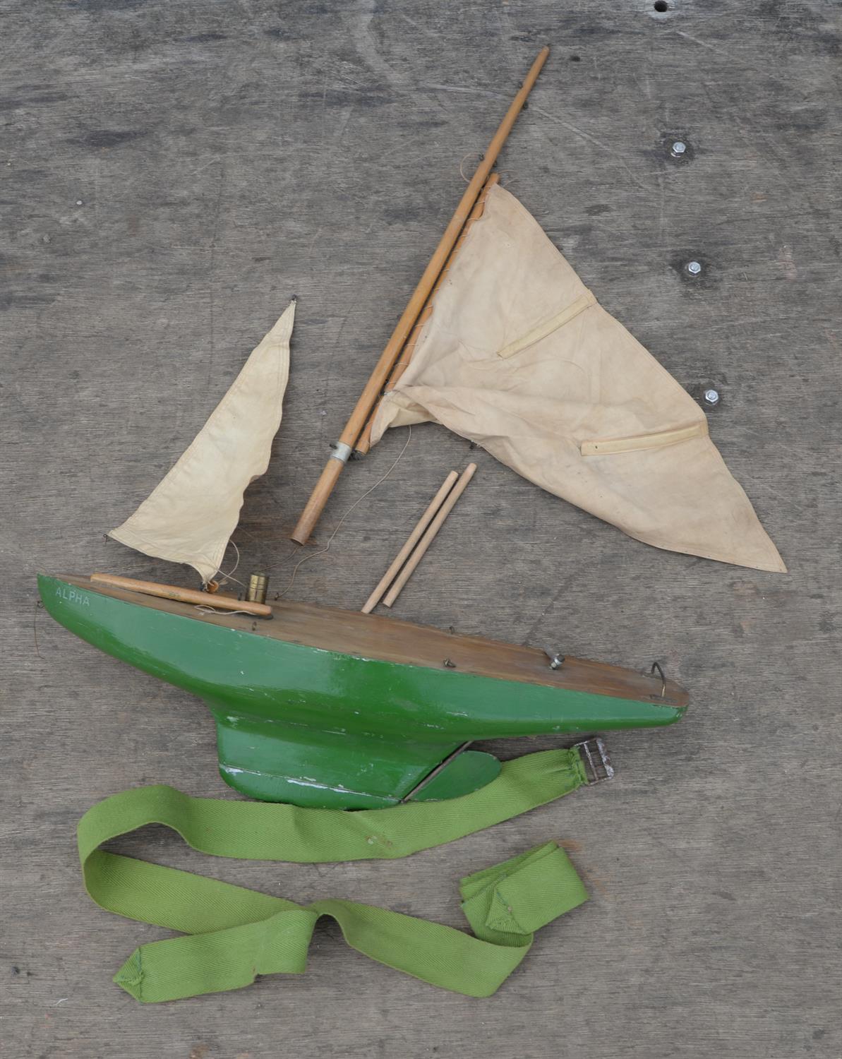 A plywood model of a boat, Beta, with cabin and electric motor, on stand, 43.5cm long, - Image 4 of 4