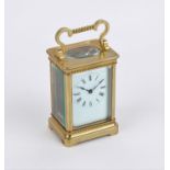 French brass carriage clock the white enamel dial with black Roman numerals, H15cm