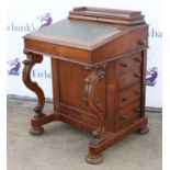 Victorian rosewood Davenport writing desk, of typical form, with stationary store above leather