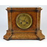 19th century burr walnut mantle clock the gilded dial with roman numerals, the two train movement